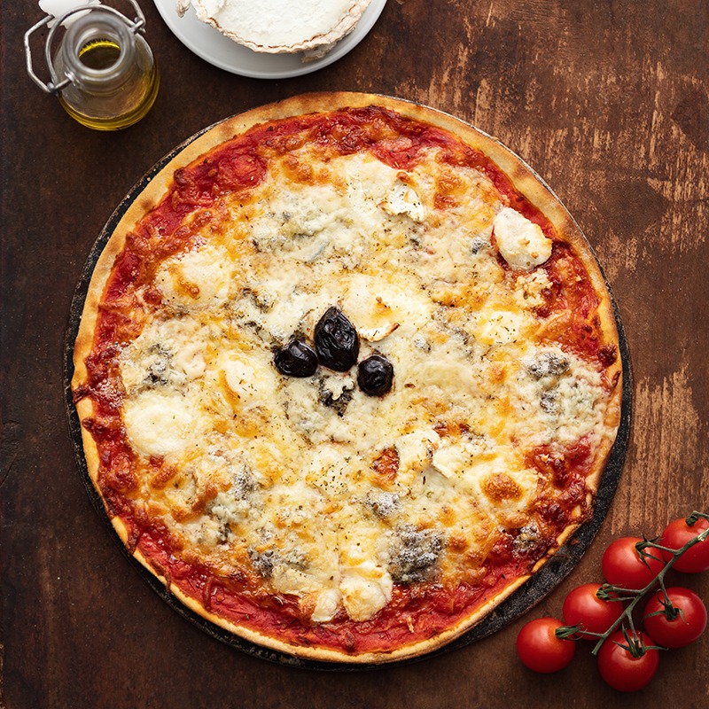 Fiery Pizza Diablo Spicy Pizza Diablo with pepperoni, chili peppers, and melted cheese on a crispy crust
